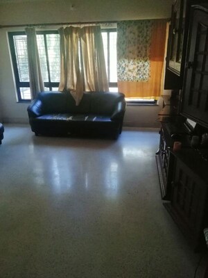 Living Room in 2 BHK Apartment at Woodland Apartments, Kothrud – for Rent