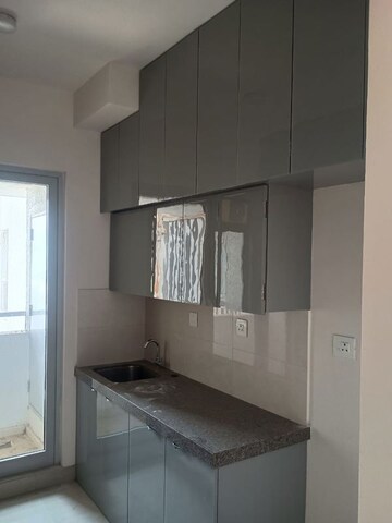 Kitchen in 2 BHK Apartment at Piramal Vaikunth, Balkum Pada – for Rent