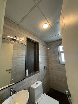 Bathroom in 2.5 BHK Builder Floor at Central Park Cerise Suites, Sohna Sector 33 – for Rent