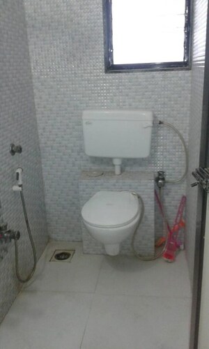 Bathroom in 2 BHK Apartment at Manju Tower CHS, Andheri West – for Rent