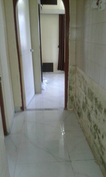 Room in 2 BHK Apartment at Manju Tower CHS, Andheri West – for Rent