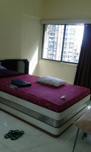 Bedroom in 2 BHK Apartment at Manju Tower CHS, Andheri West – for Rent