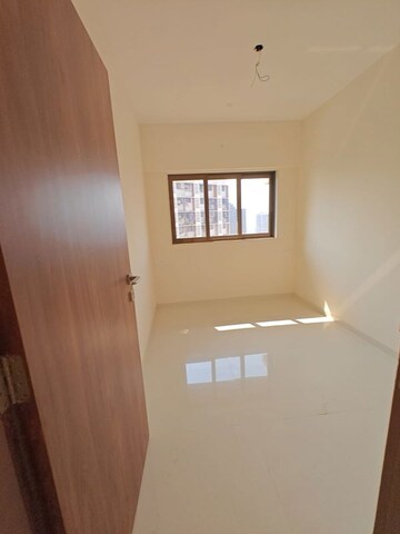 Room in 2.5 BHK Apartment at Lotus Sky Garden, Malad West – for Sale