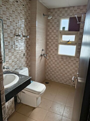 Bathroom in 3 BHK Apartment at AWHO 8B, Vrindavan Yojna – for Rent