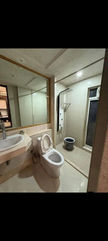 Bathroom in 3 BHK Apartment at Sheth Vasant Lawns, Laxmi Nagar – for Rent