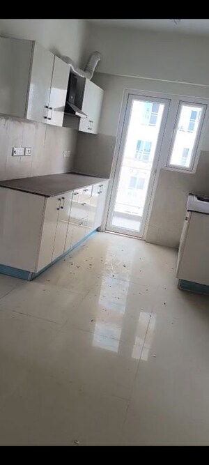 Kitchen in 2 BHK Apartment at Samridhi Luxuriya Avenue, Sector 150 – for Rent
