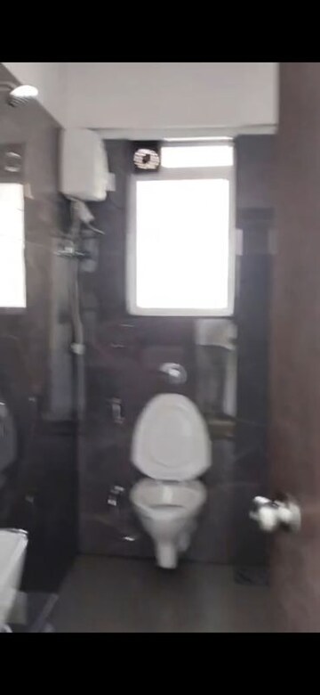 Bathroom in 2 BHK Apartment at JD Happy Home Enclave, Goregaon West – for Rent