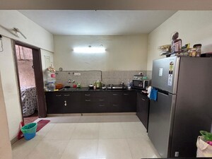 Kitchen in 2 BHK Apartment at Brahma Suncity, Wadgaon Sheri – for Rent