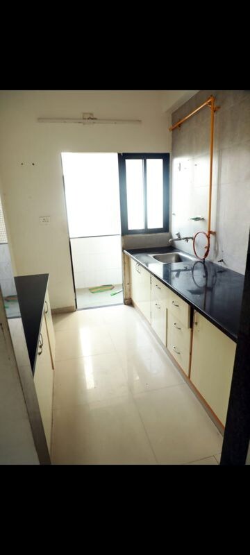 Kitchen in 2 BHK Apartment at Unique Essenza, Chanakyapuri – for Rent