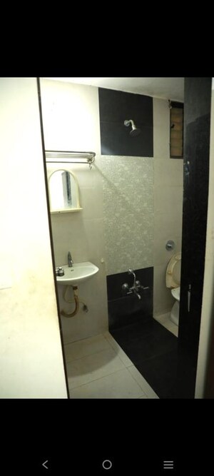 Bathroom in 2 BHK Apartment at Unique Essenza, Chanakyapuri – for Rent