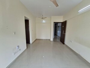 Room in 1 BHK Apartment at The Wadhwa Solitaire, Kolshet Road – for Rent