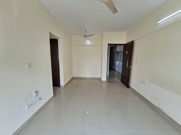 Room in 1 BHK Apartment at The Wadhwa Solitaire, Kolshet Road – for Rent