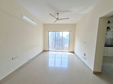 Room in 1 BHK Apartment at The Wadhwa Solitaire, Kolshet Road – for Sale