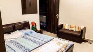 Bedroom in 3 BHK Apartment at Rohini Sector 9 – for Rent