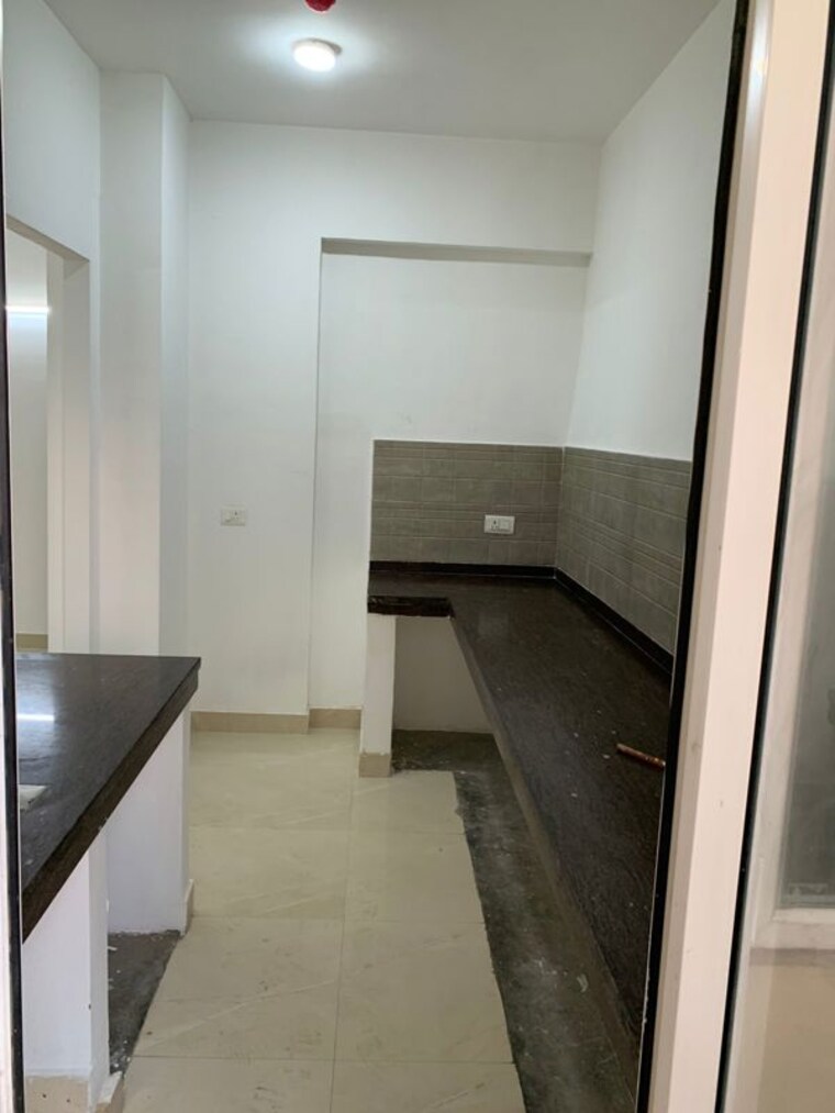 Kitchen, mahagun-moderne 3 Bedroom 1900 Sq.Ft. Apartment In Sector 78 Noida 9858138