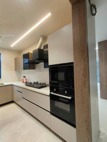 Kitchen in 1 BHK Apartment at Enkay Towers, Sector 19 – for Rent