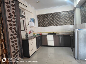Kitchen in 2 BHK Apartment at Panchsheel Wellington, Dundahera – for Sale