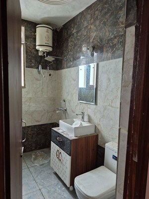 Bathroom in 3 BHK Apartment at Dhakoli – for Rent