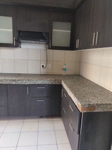 Kitchen in 3 BHK Apartment at Amrapali Heartbeat City, Sector 107 – for Rent