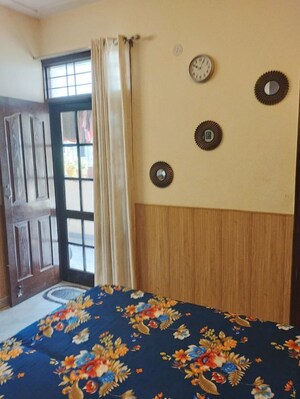 Bedroom in 2 BHK Builder Floor at Dhakoli – for Sale
