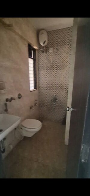 Bathroom in 2 BHK Apartment at Asmita Sand Dunes, Malad West – for Rent