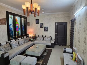 Living Room in 3 BHK Apartment at Supertech Livingston, Sain Vihar – for Sale