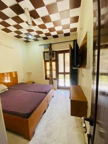 Bedroom in 3 BHK Builder Floor at RWA Residential Society Sector 46, Sector 46 – for Rent