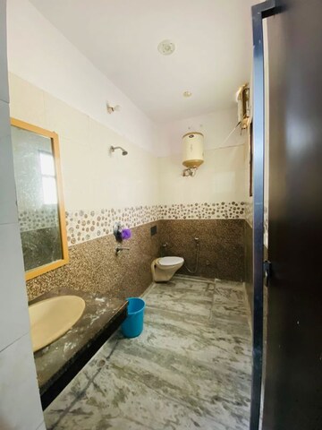 Bathroom in 3 BHK Builder Floor at RWA Residential Society Sector 46, Sector 46 – for Rent