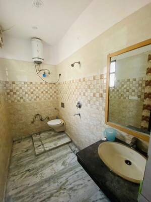 Bathroom in 3 BHK Builder Floor at RWA Residential Society Sector 46, Sector 46 – for Rent