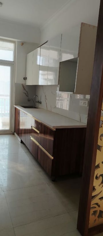 Kitchen in 2 BHK Apartment at Saya Gold Avenue, Vaibhav Khand – for Sale