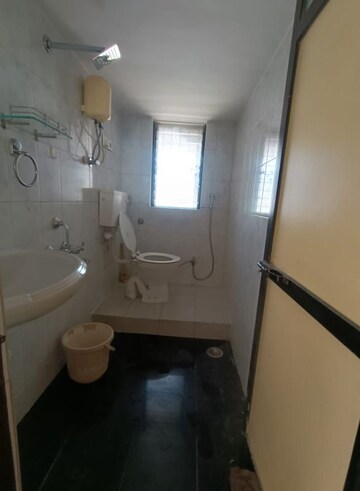 Bathroom in 3 BHK Apartment at Atul Blue Horizon II, Malad West – for Rent