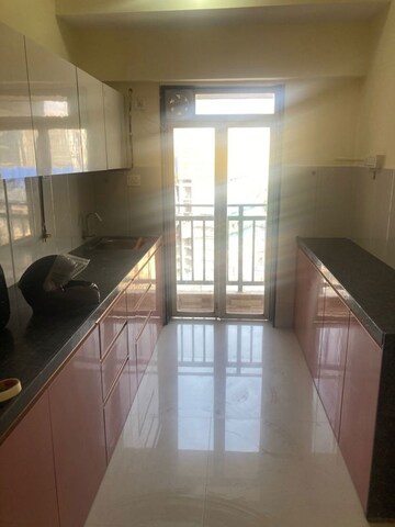 Kitchen in 3 BHK Apartment at Conwood Enclave, Vasant Vihar – for Rent