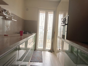 Kitchen in 3 BHK Apartment at Romell Diva, Malad West – for Rent