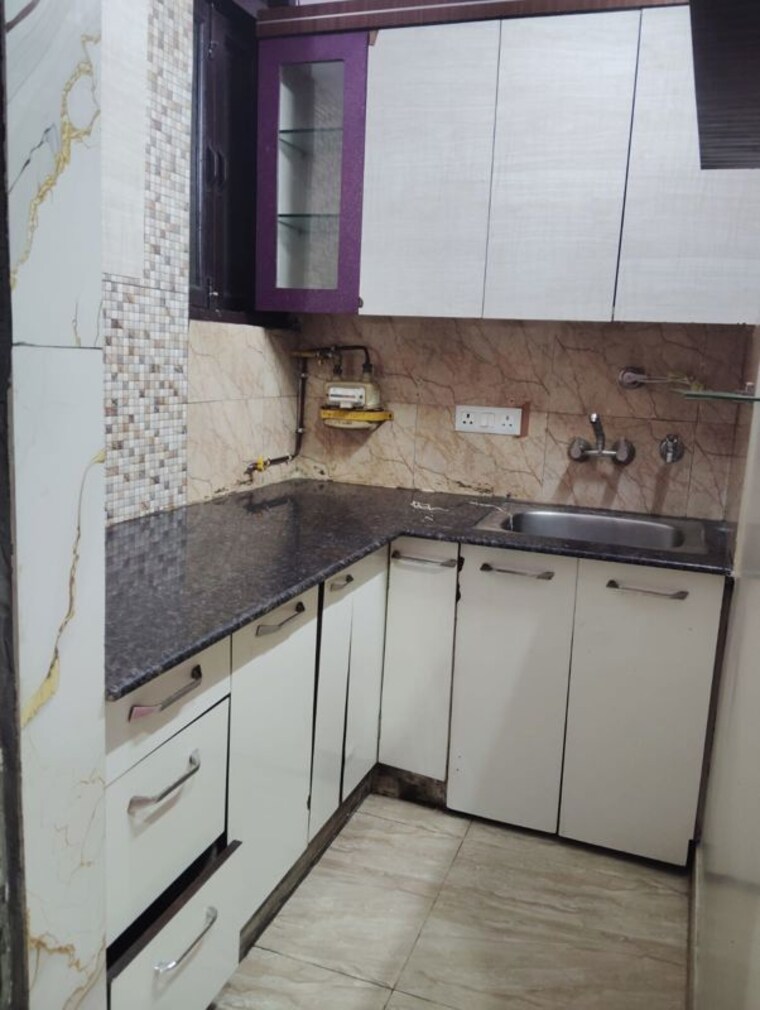 Kitchen, niti khand i 3 Bedroom 900 Sq.Ft. Apartment In Niti Khand I Ghaziabad 9859813