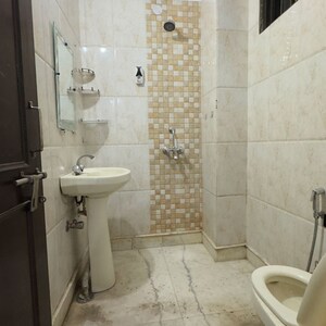 Bathroom in 1 BHK Apartment at Chattarpur – for Rent