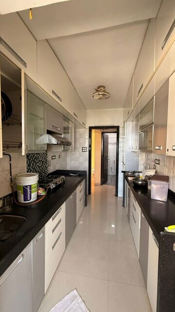 Kitchen in 1 BHK Apartment at RNA Regency Park, Kandivali West – for Sale