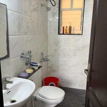 Bathroom in 1 BHK Apartment at K Raheja Gardens, Netaji Nagar – for Rent