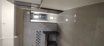 Kitchen in 1 BHK Apartment at Shree Sadguru CHS, Kalwa – for Sale