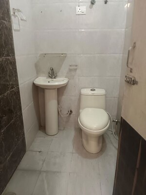 Bathroom in 2 BHK Apartment at Shakti Khand Iii – for Rent