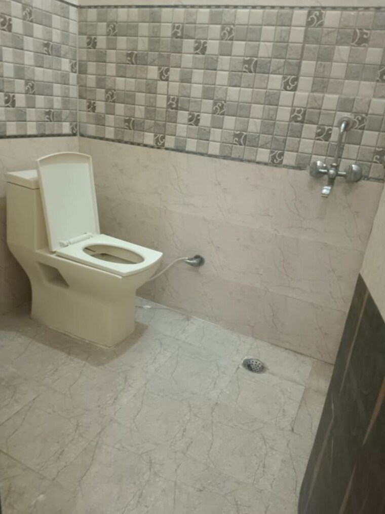 Bathroom, shakti khand iii 2 Bedroom 900 Sq.Ft. Apartment In Shakti Khand Iii Ghaziabad 9860653