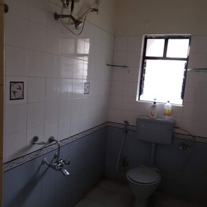 Bathroom in 2 BHK Apartment at Sai Dwarkamai CHS, Nibm – for Rent