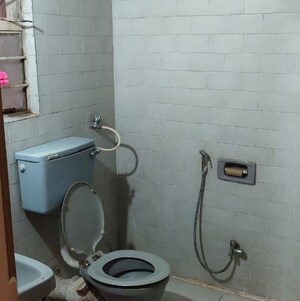 Bathroom in 2 BHK Apartment at Sai Dwarkamai CHS, Nibm – for Rent