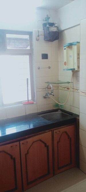 Kitchen in 1 BHK Apartment at Bindra Complex, Andheri East – for Rent