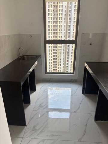 Kitchen in 1 BHK Apartment at Raymond Ten X Habitat, Pokhran Road No Two – for Sale