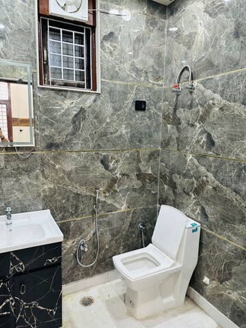 Bathroom in 3 BHK Apartment at Niti Khand I – for Rent