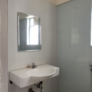 Bathroom in 3 BHK Apartment at SiddhiVinayak Sunshree Emerald, Nibm – for Rent