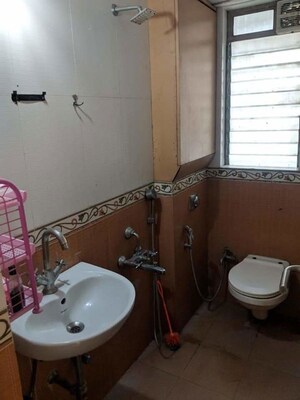 Bathroom in 3 BHK Apartment at Riddhi Tower, Malad East – for Rent