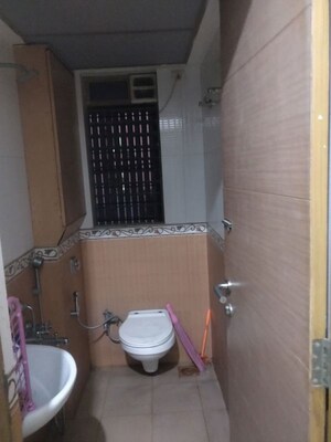 Bathroom in 3 BHK Apartment at Riddhi Tower, Malad East – for Rent