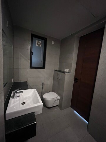 Bathroom in 1 BHK Apartment at Krisumi Waterfall Suites, Sector 36a – for Rent