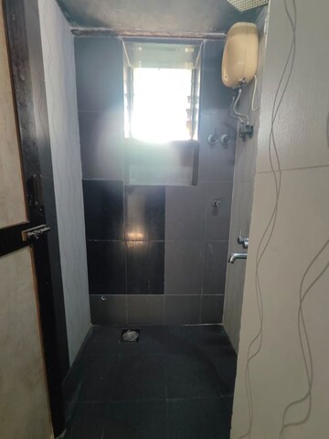 Bathroom in 1 BHK Apartment at Manali CHS Malad, Malad West – for Rent
